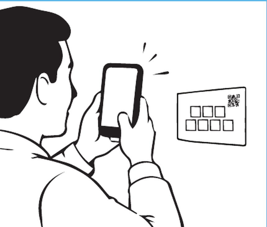 A person filming their dance on a phone next to a QR code card
